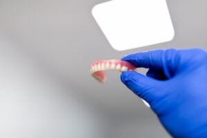 dental bridge vs implant